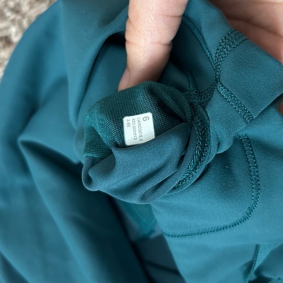 Lululemon Wunder Train High-Rise Tight 25"
Storm Teal Sz 6 - Picture 12 of 12